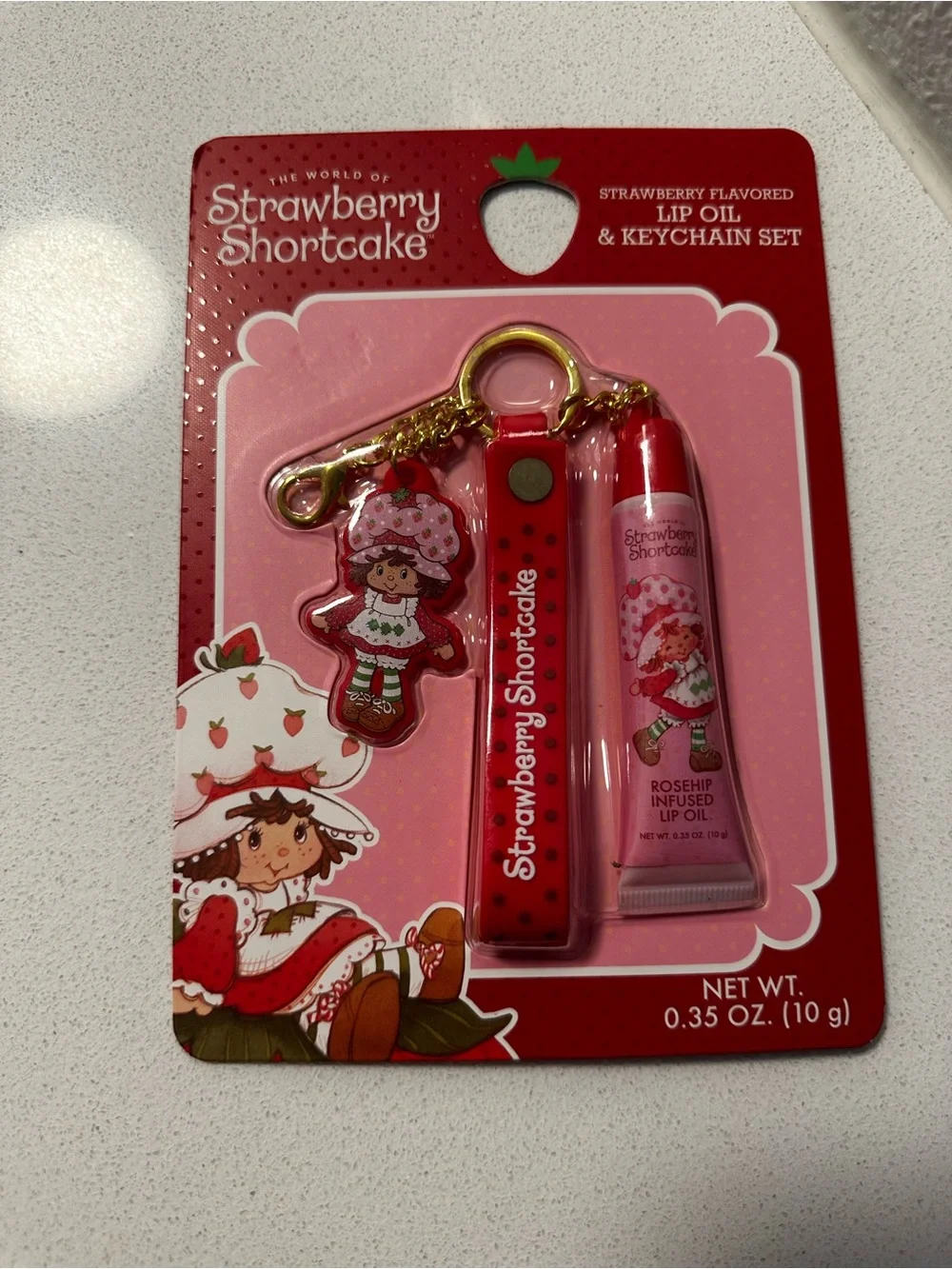 Strawberry Shortcake Makeup brush set, lip gloss and keychain, socks- Pink/Red
